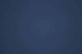 A dark blue gradient background
