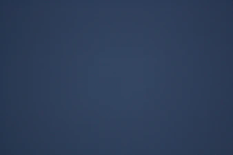 A dark blue gradient background