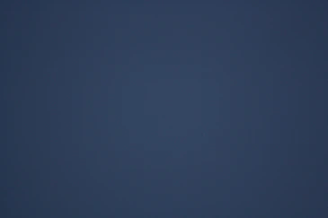 A dark blue gradient background
