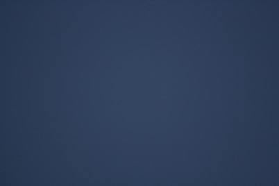 A dark blue gradient background