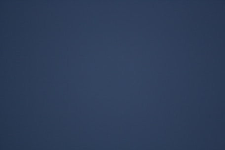 A dark blue gradient background