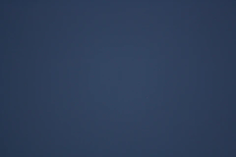 A dark blue gradient background