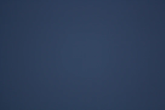A dark blue gradient background