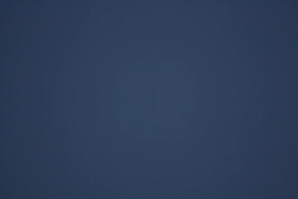 A dark blue gradient background