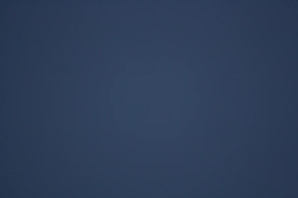 A dark blue gradient background