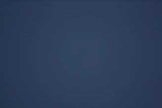 A dark blue gradient background