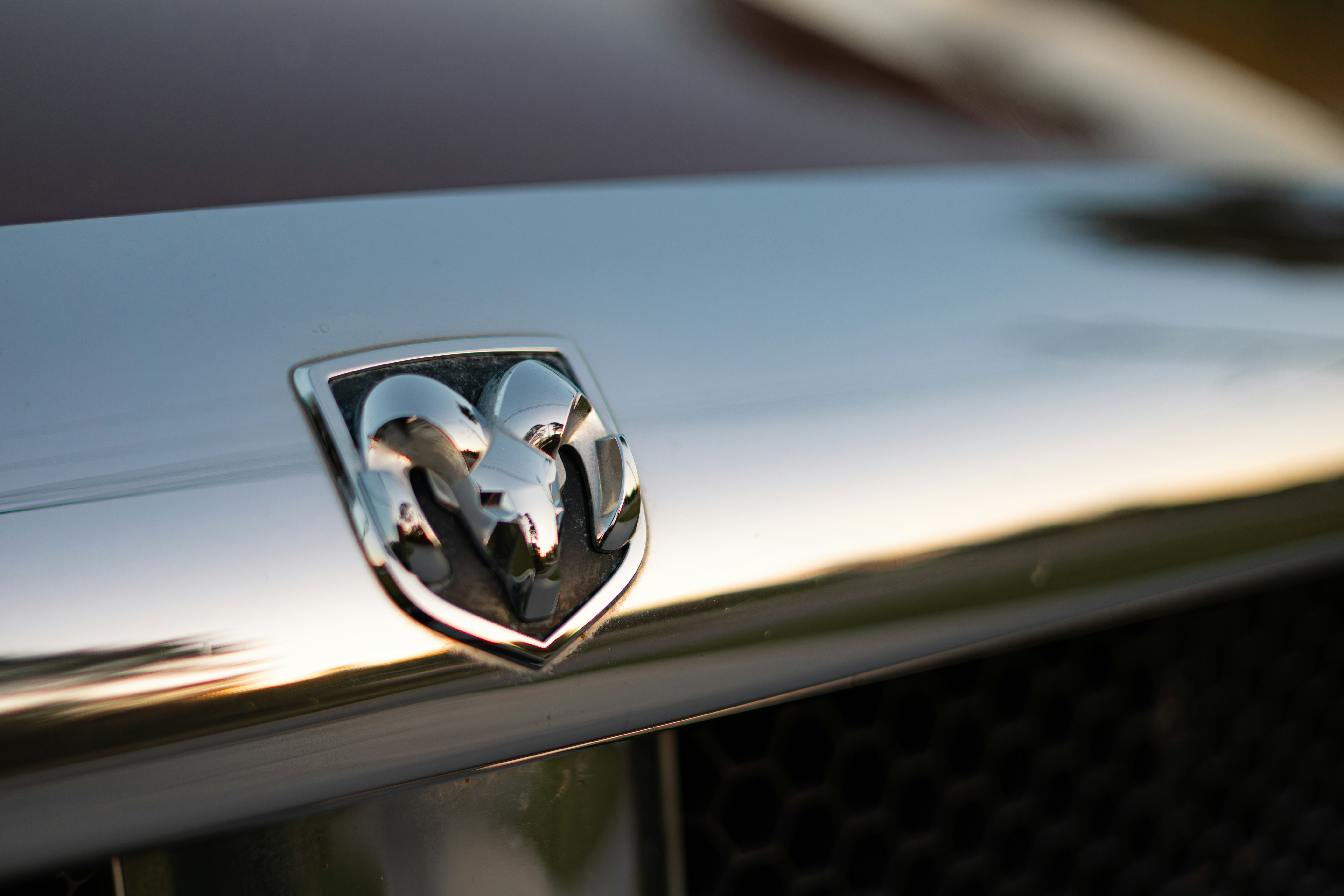 Close-up of a dodge ram truck emblem