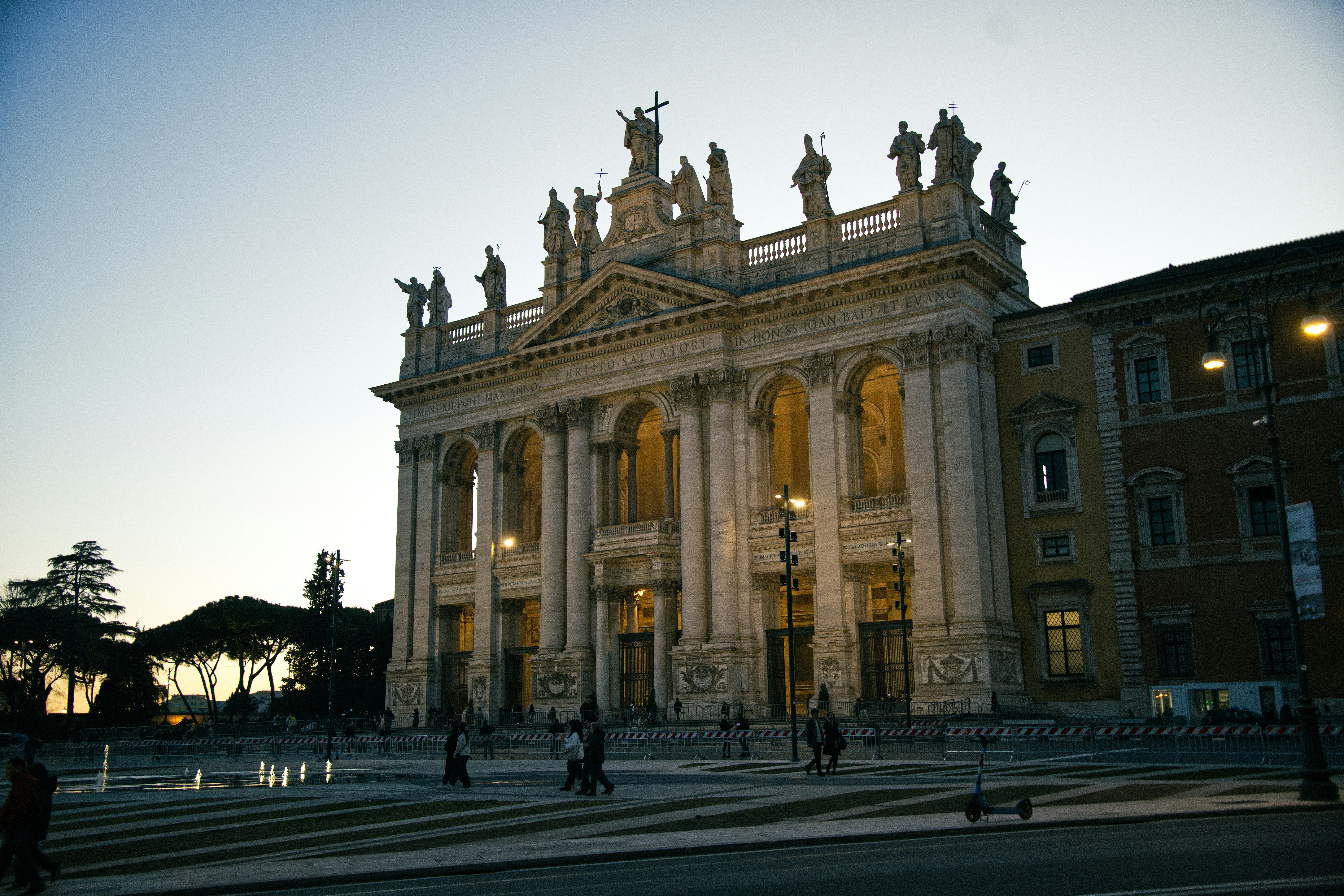 Grand historic building with people walking outside