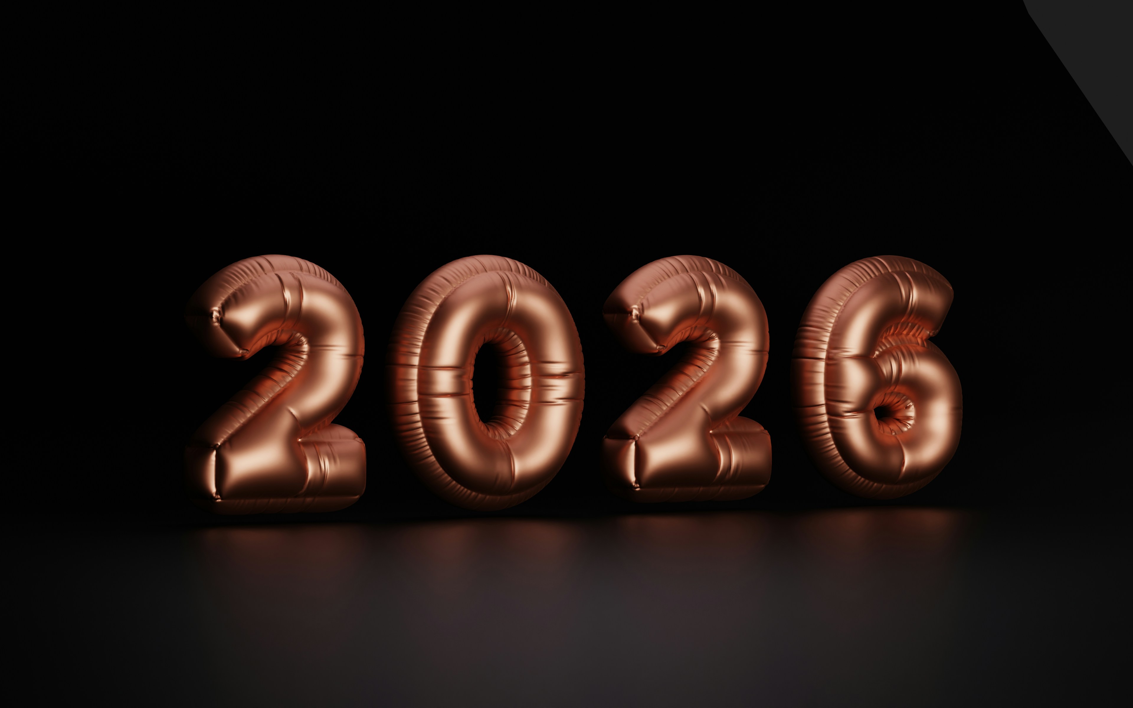 Copper balloons spelling out the year 2026