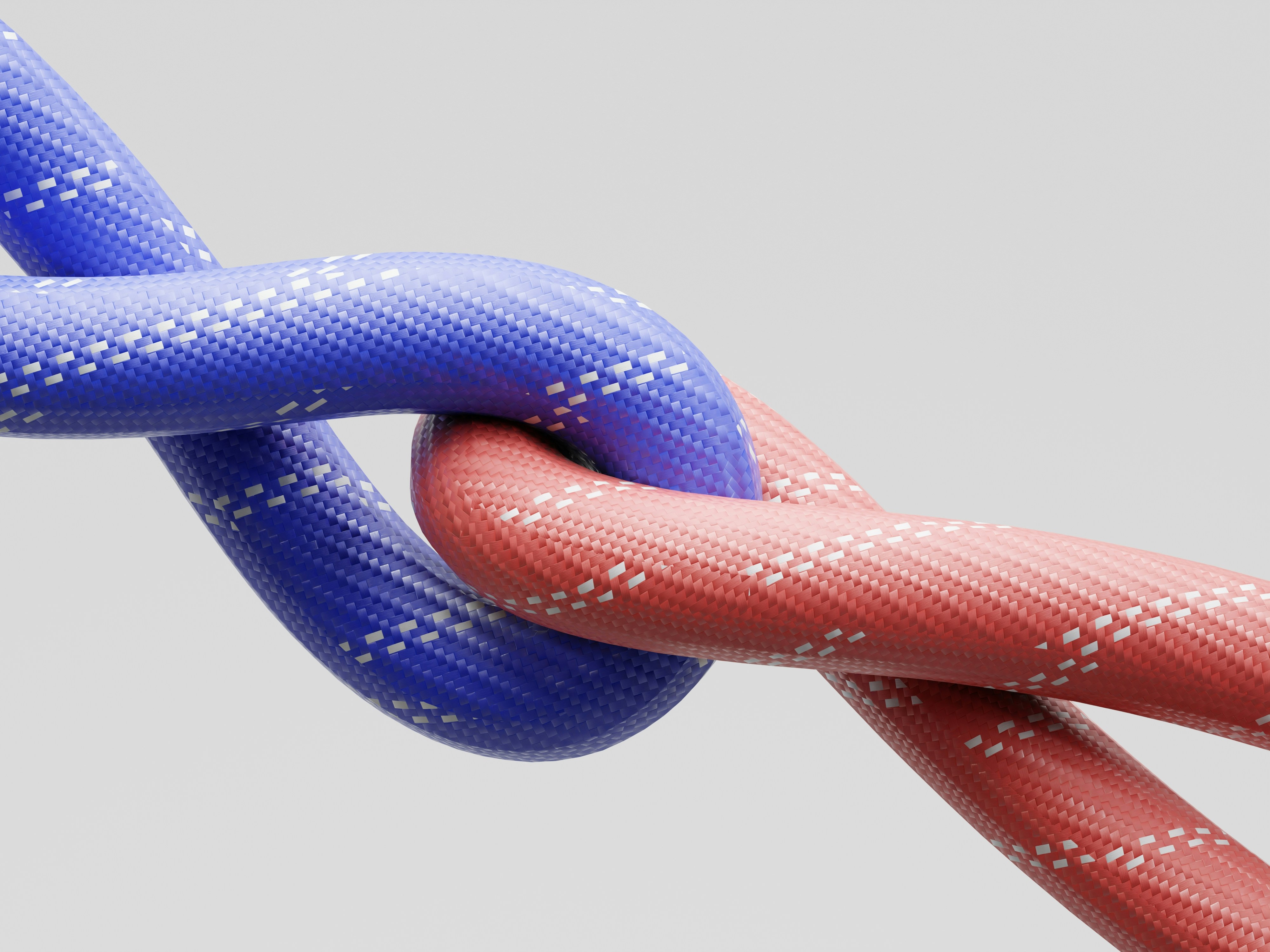 Two intertwined ropes, one blue, one red