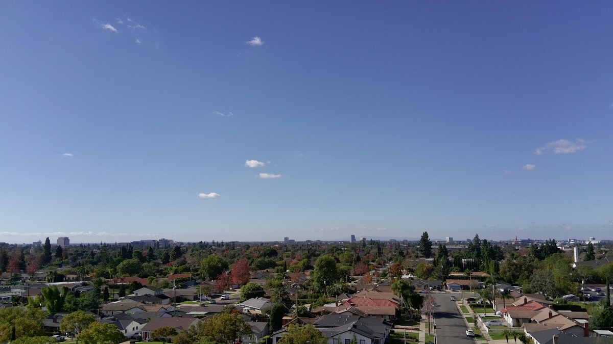 Suburban neighborhood under a clear blue sky