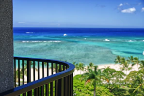 Balcony view of tropical beach and turquoise ocean