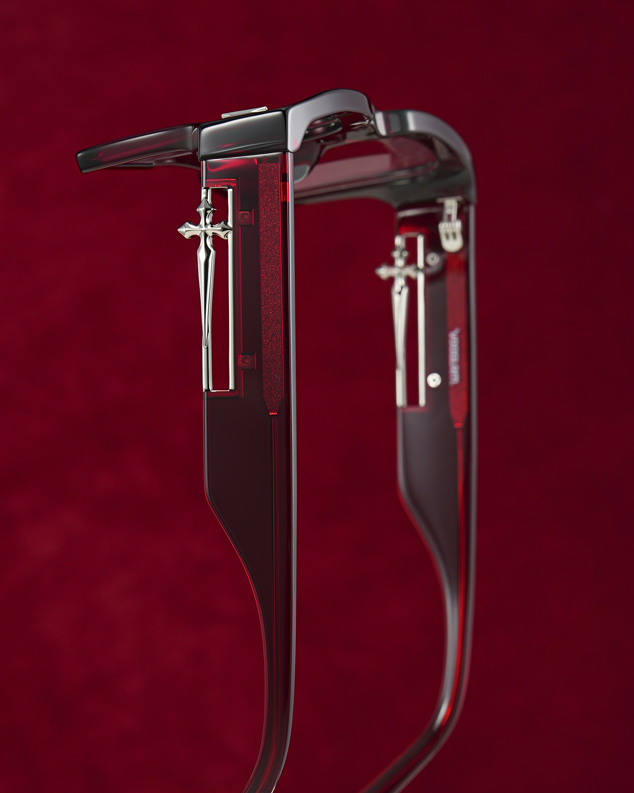 Close-up of red glasses on a red background