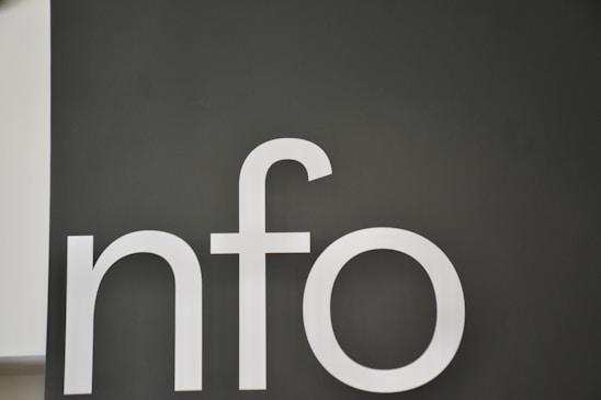 White letters nfo on dark gray background