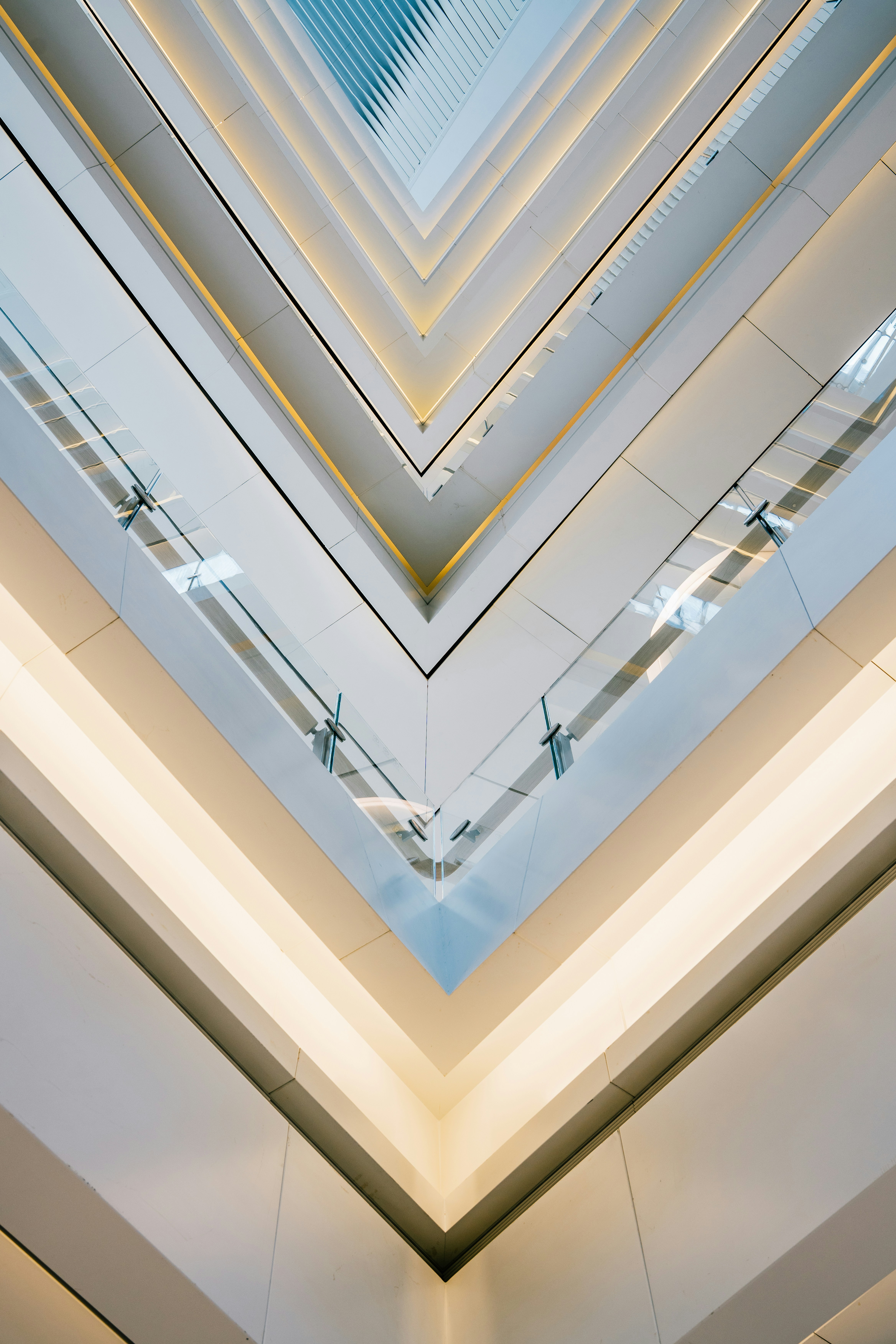Modern building interior looking up at glass ceiling