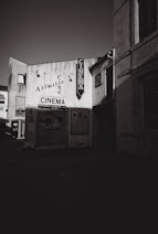 An old atlantic cinema building at night