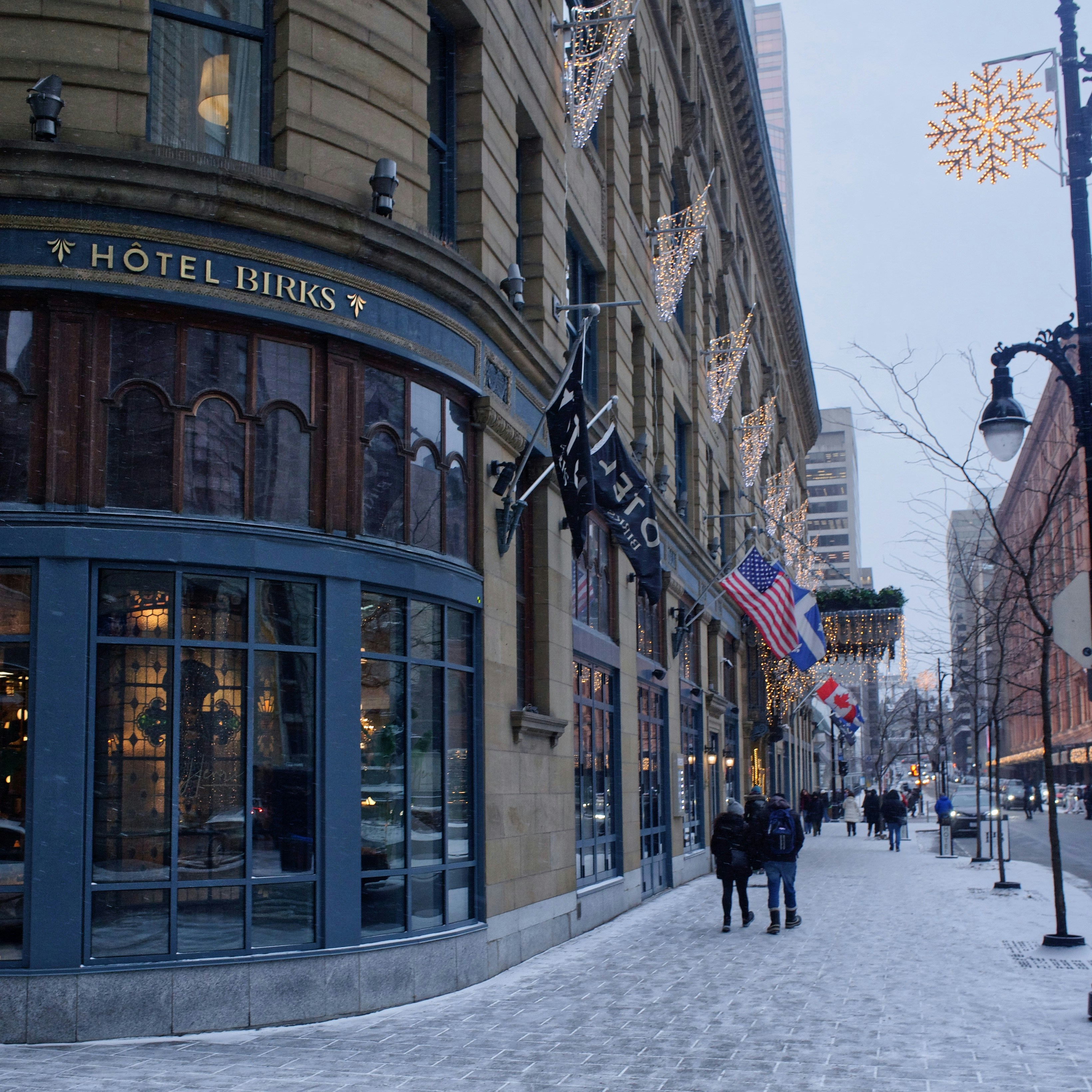 Hotel birks building on a snowy city street