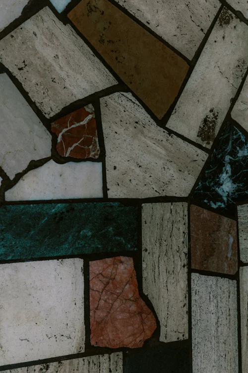 Abstract pattern of multicoloured stone tiles