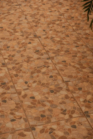 Tiled floor with stone pattern