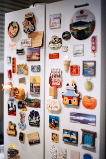 Refrigerator doors covered with colorful magnets