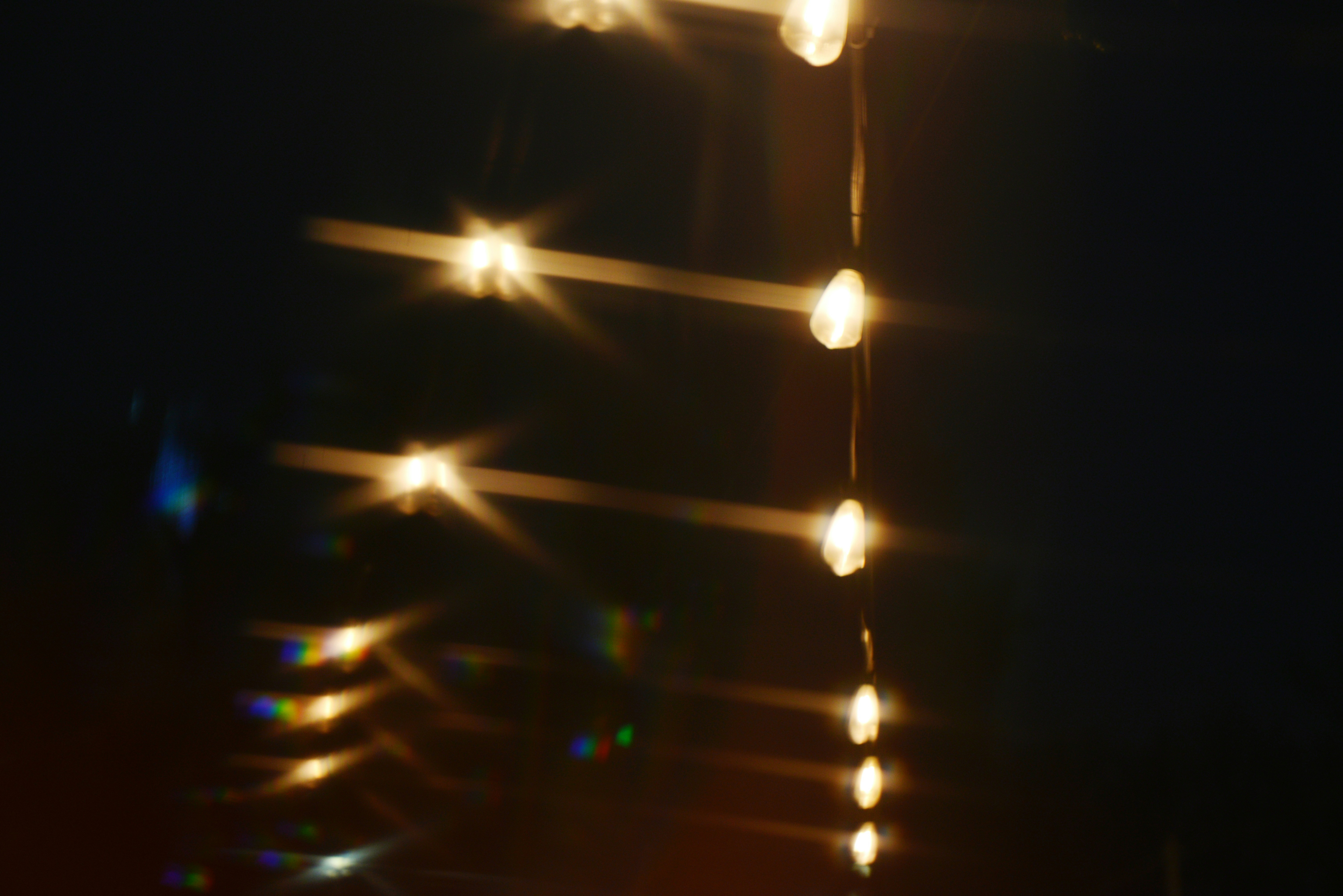 String of glowing lights with lens flare
