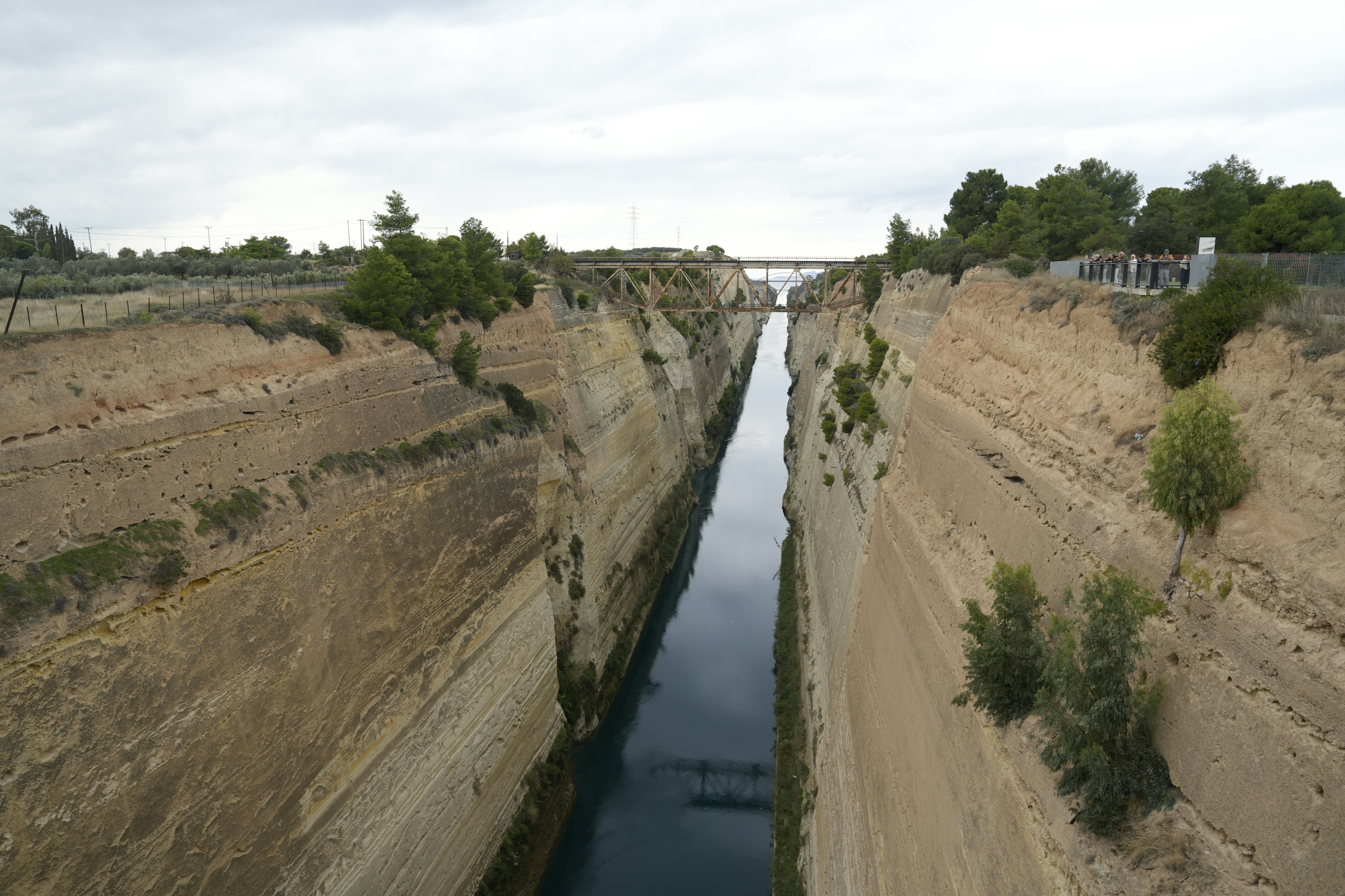 A narrow canal carved through steep, rocky cliffs.