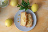 Two slices of lemon cake on a plate