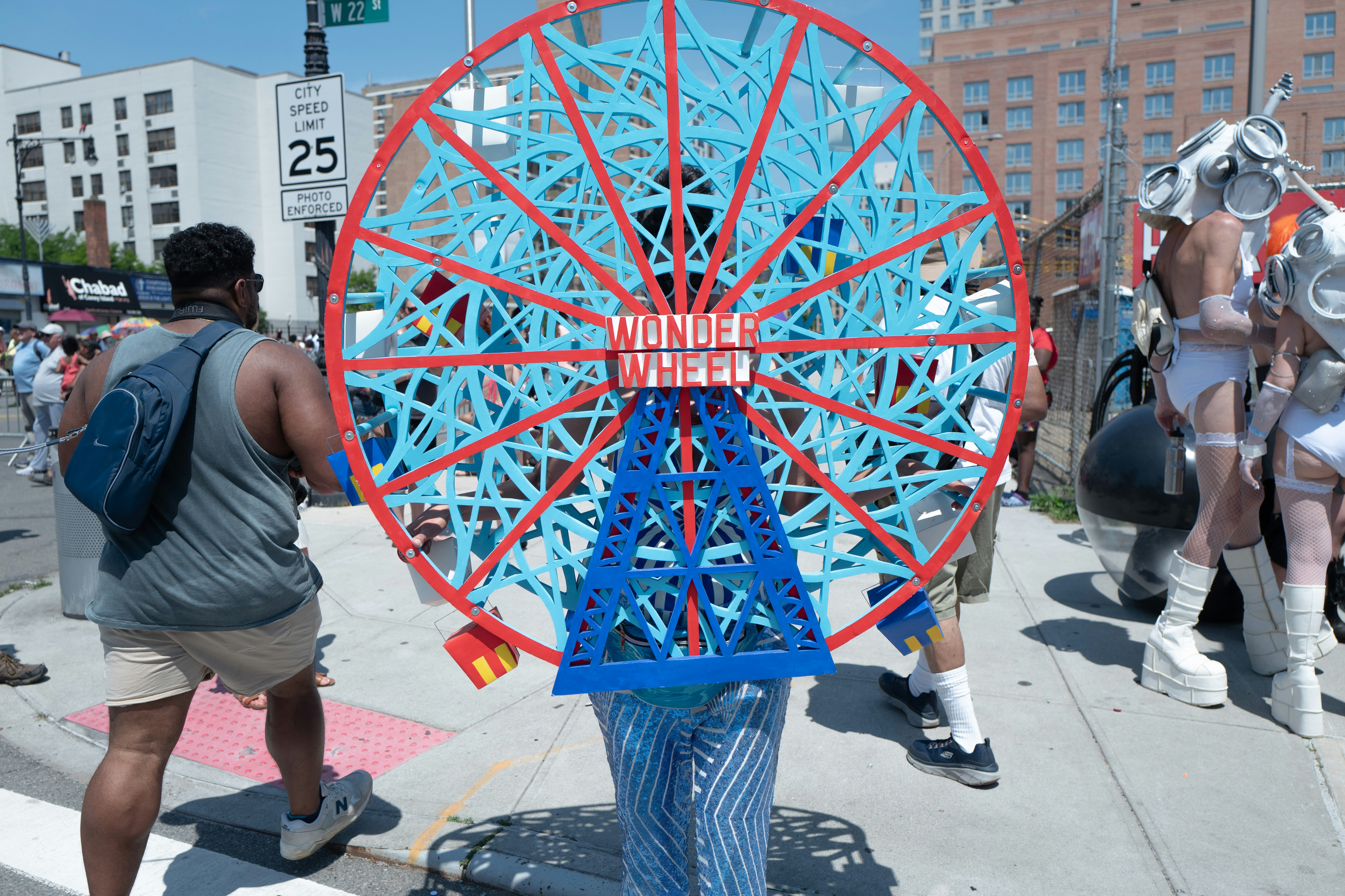 Person in a ferris wheel costume at a parade