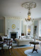 Elegant living room with antique furniture and chandelier
