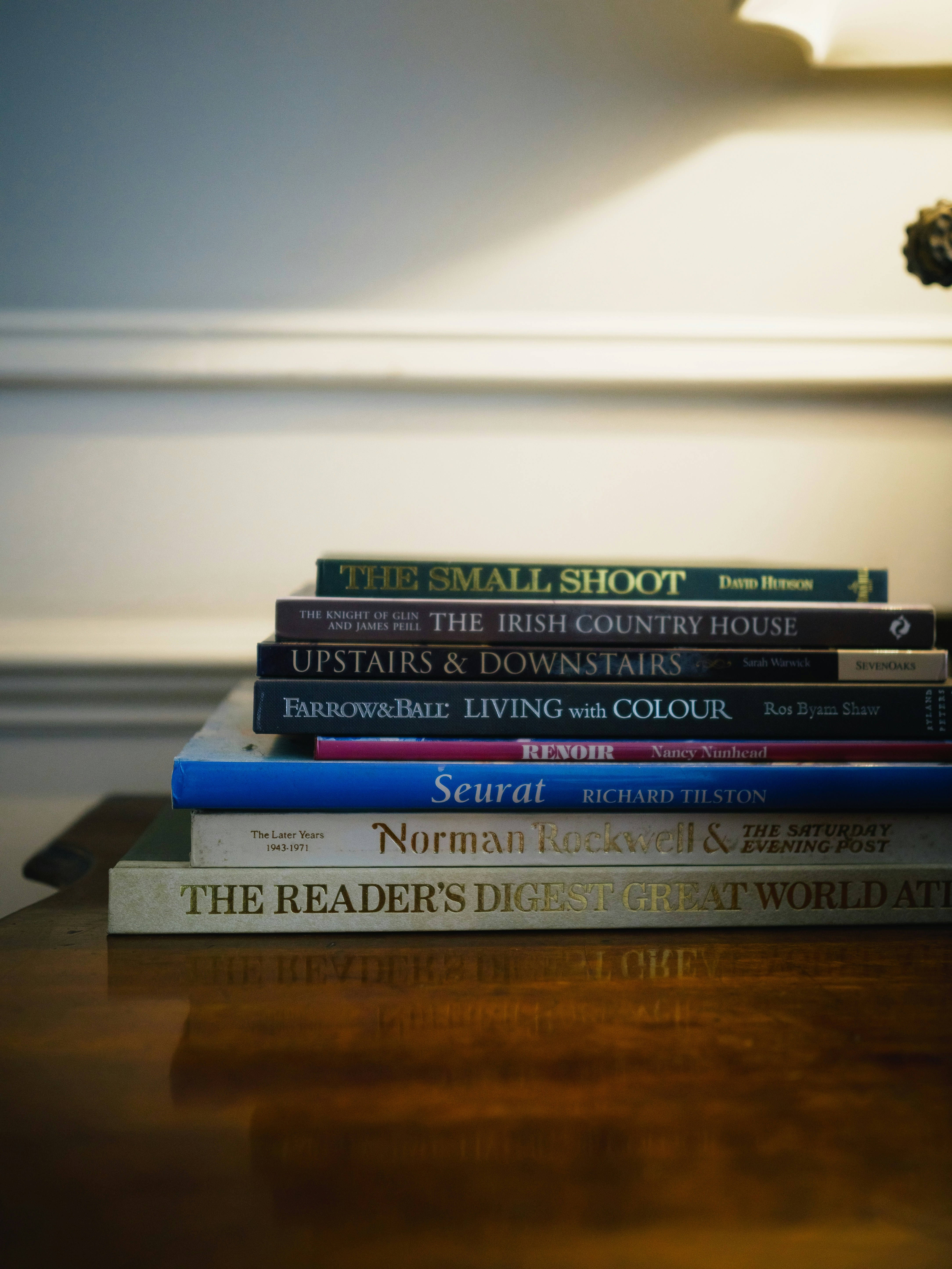 Stack of books on a wooden table