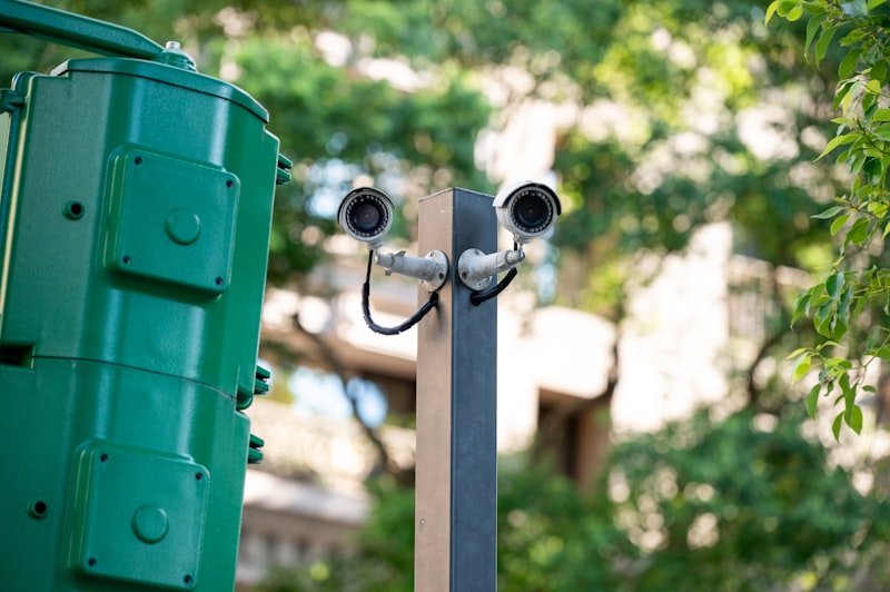 Multiple security cameras mounted on pole