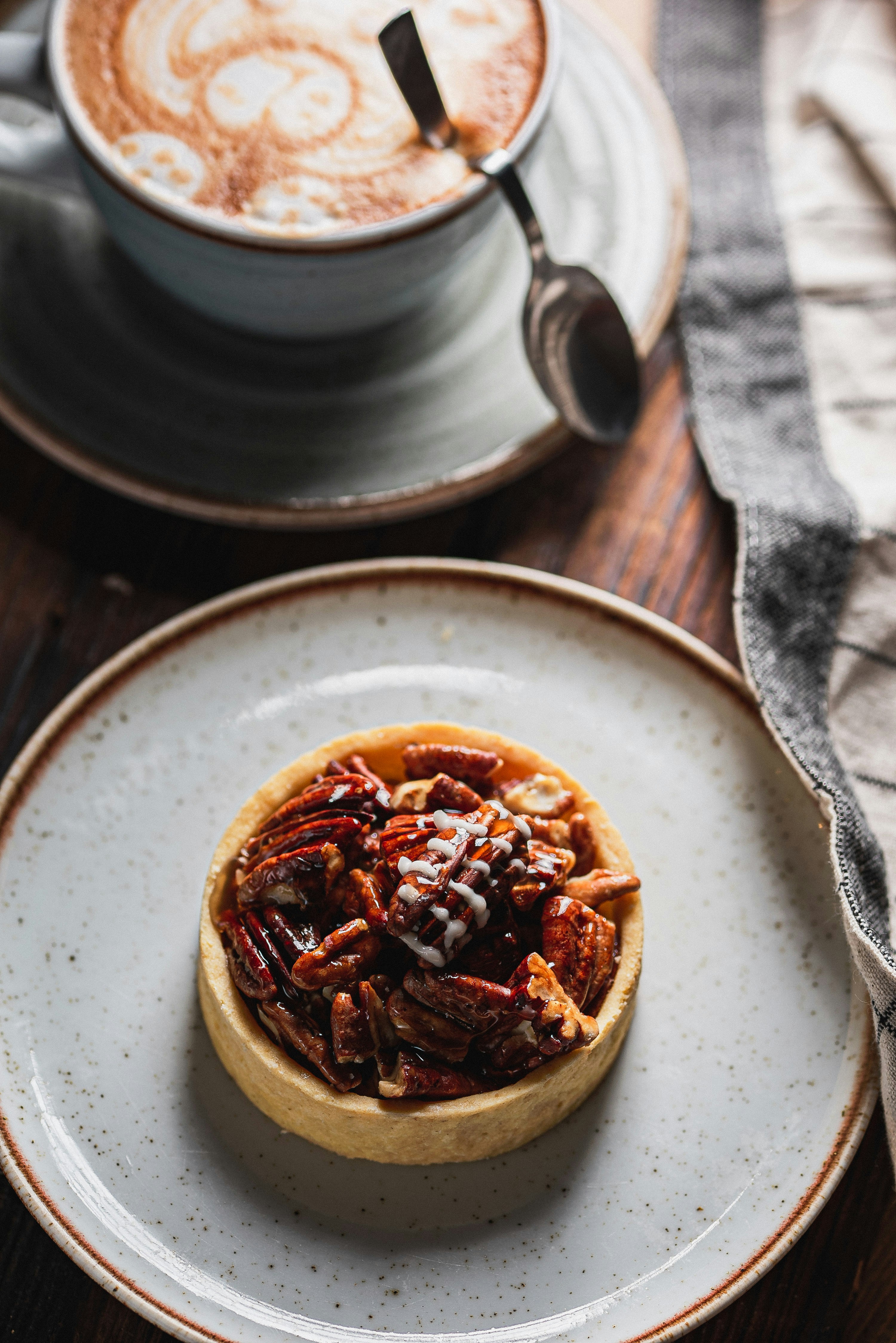 Pecan tart with a cup of coffee