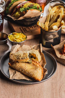 Fried empanadas with french fries and tacos