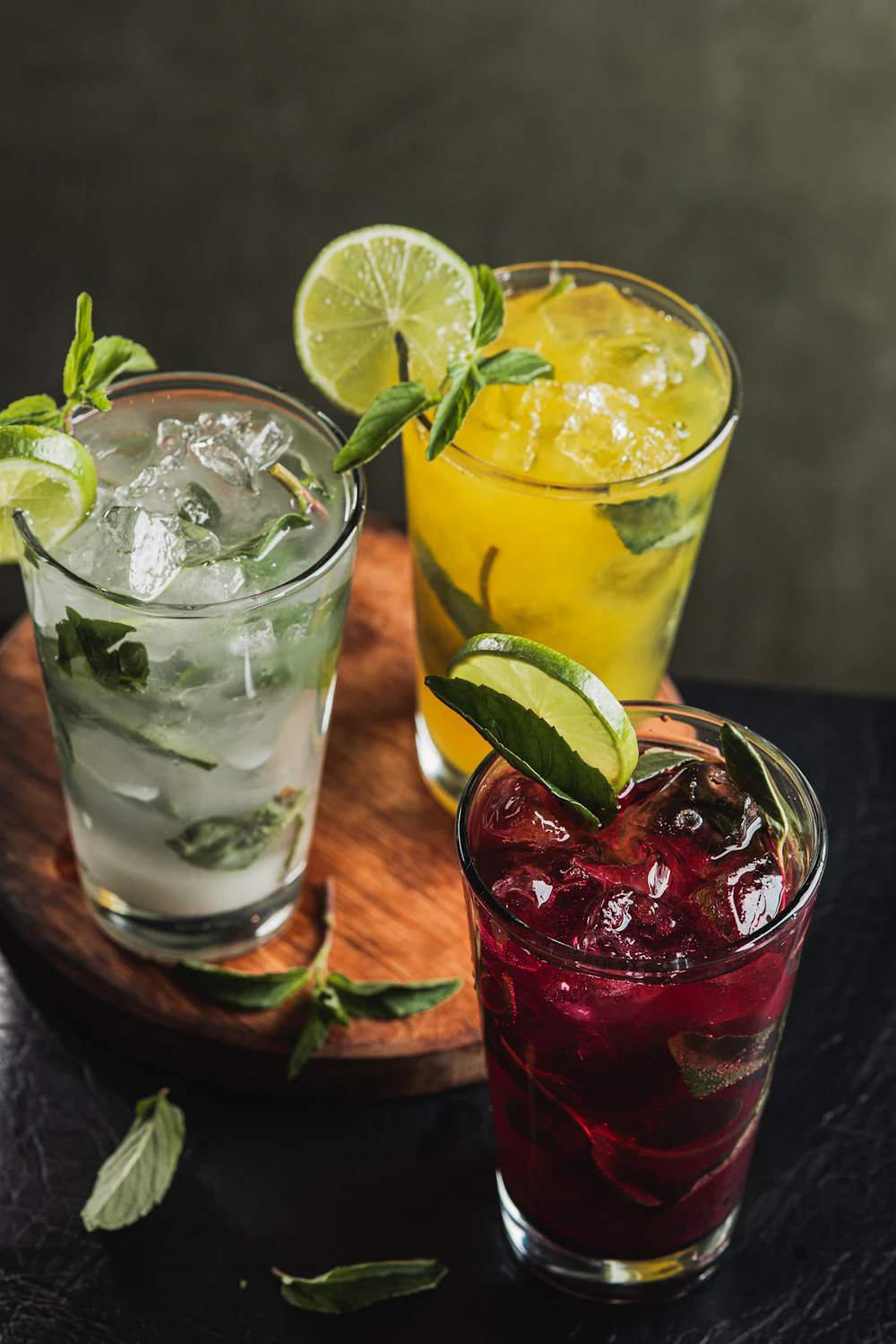 Three colorful citrus and mint drinks. Serving inspiration by Diego Arenas de Rodrigo.
