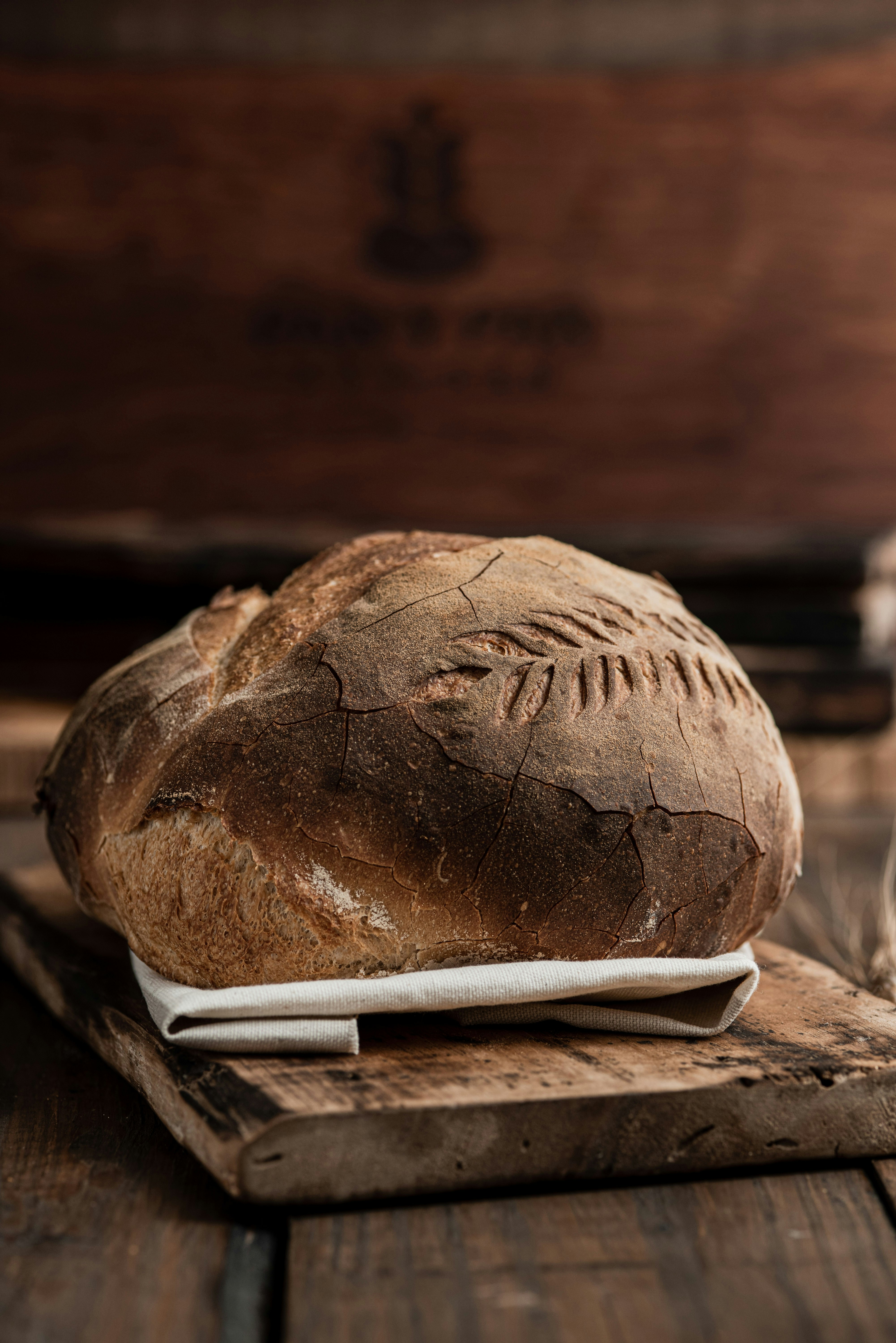 Crusty artisan bread on a wooden board