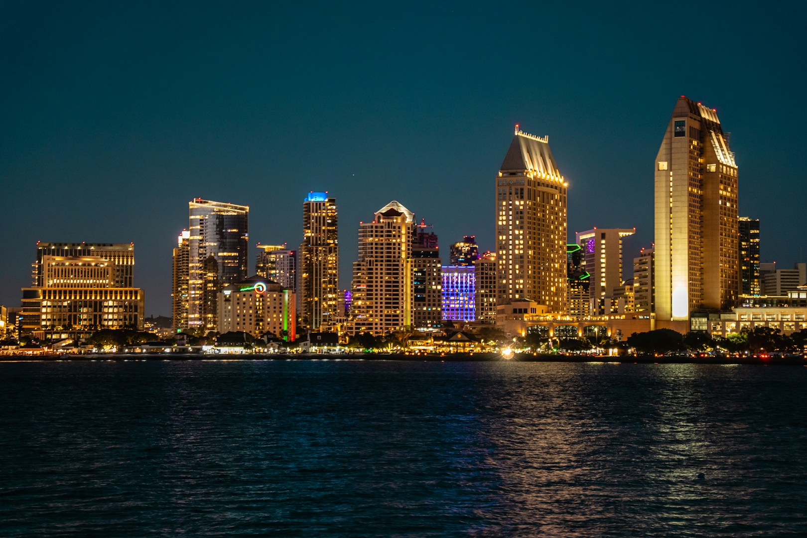 San Diego city skyline illuminated at night over water