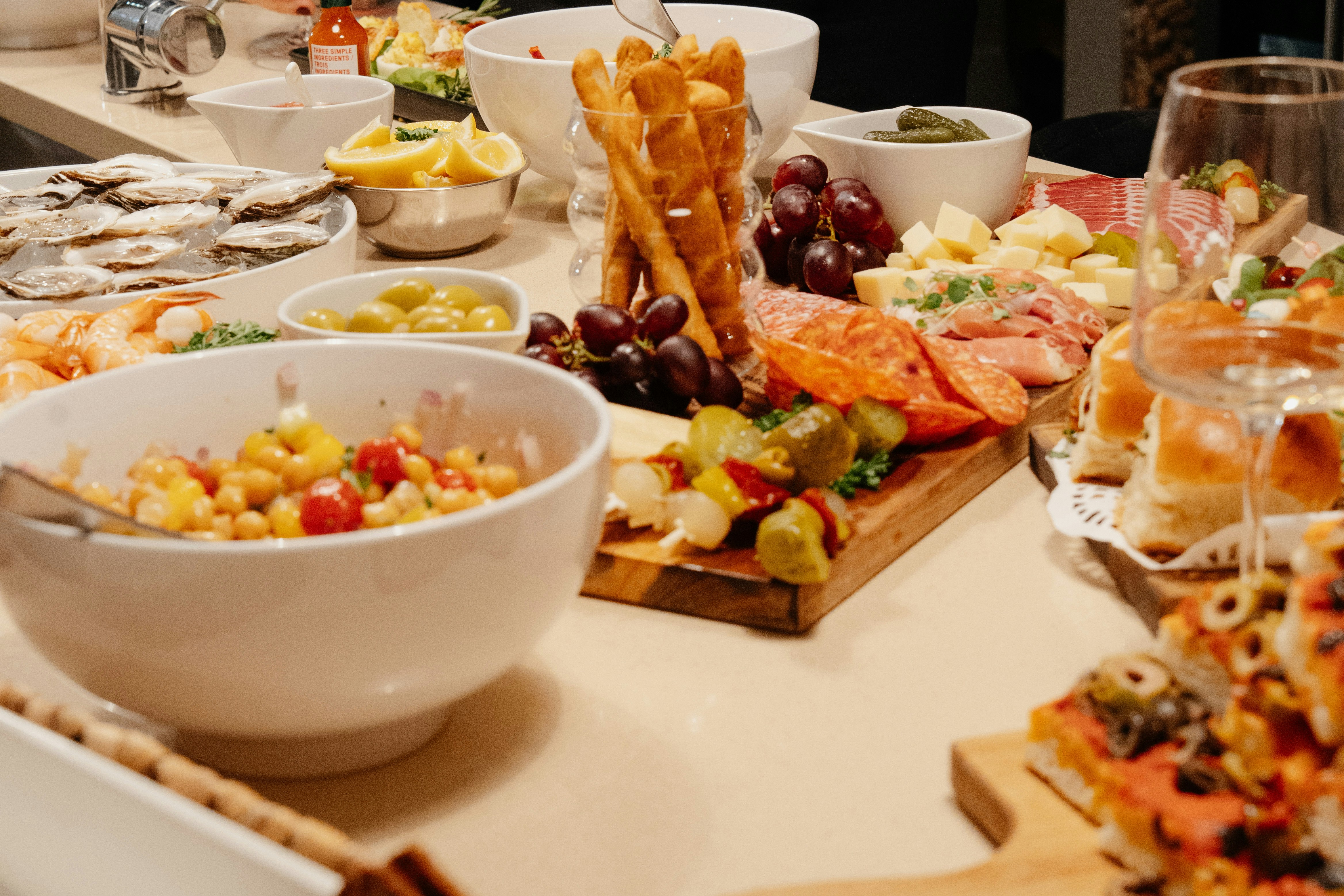 A table filled with a variety of appetizers and snacks.