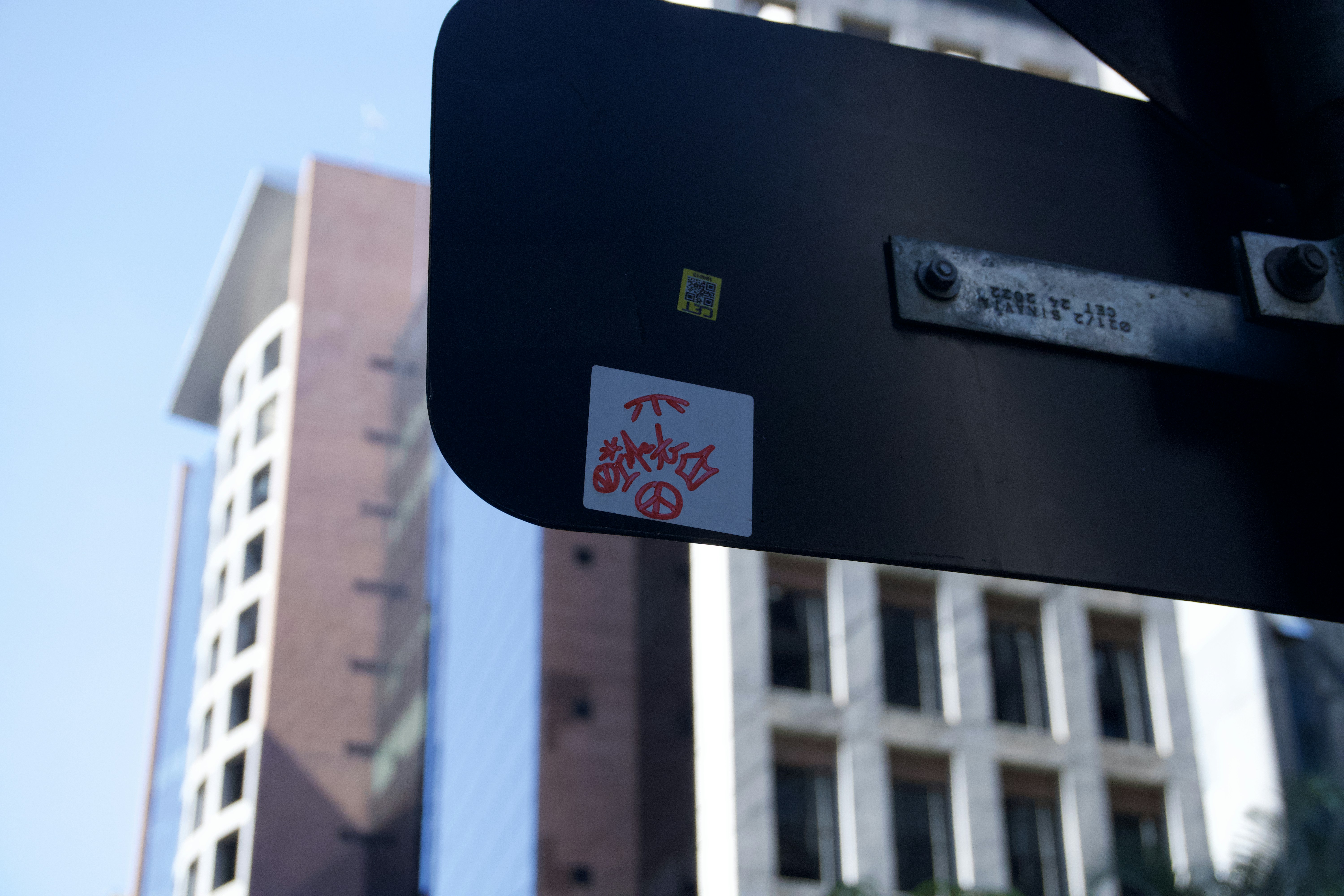 Sticker on traffic sign