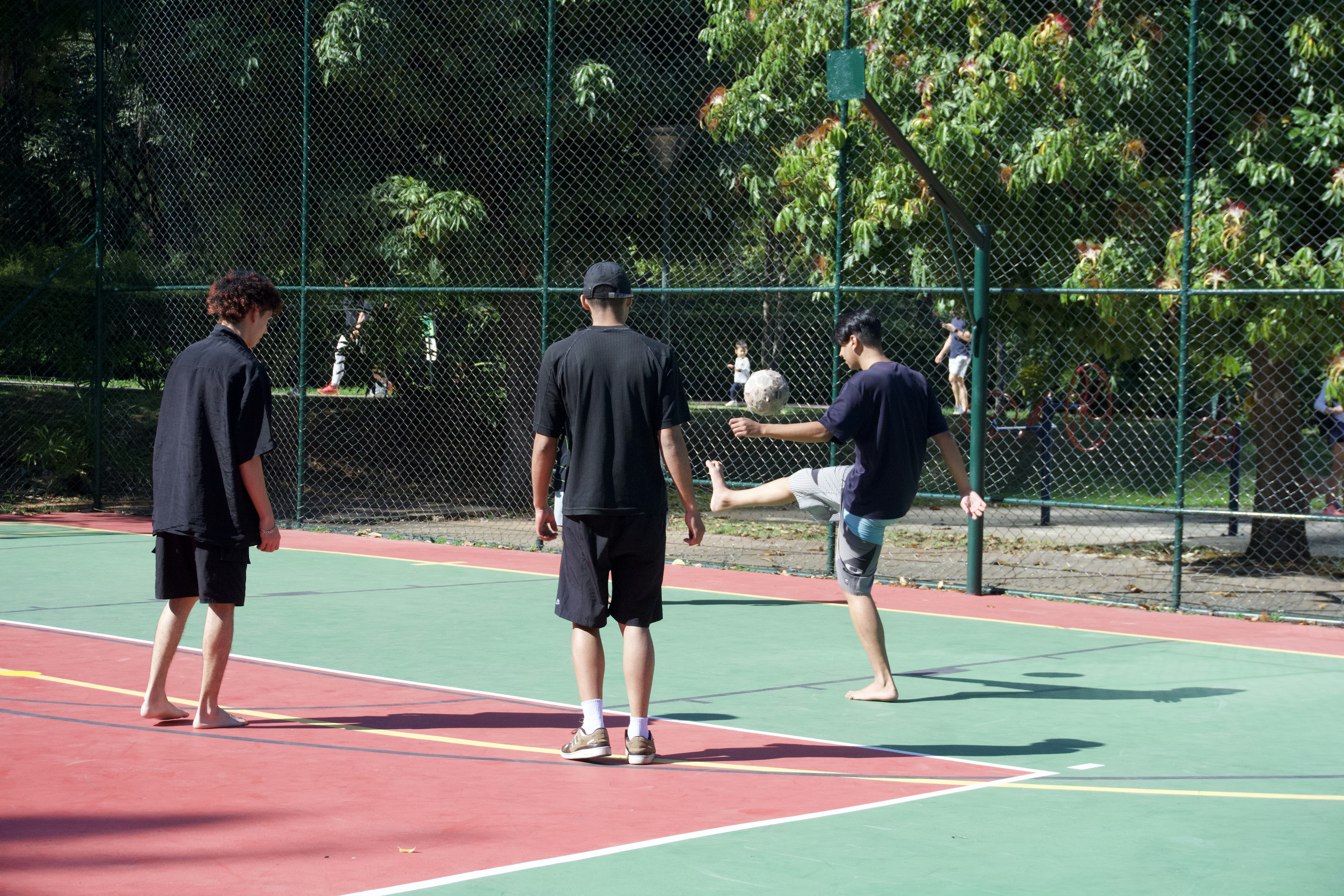 Friends playing soccer
