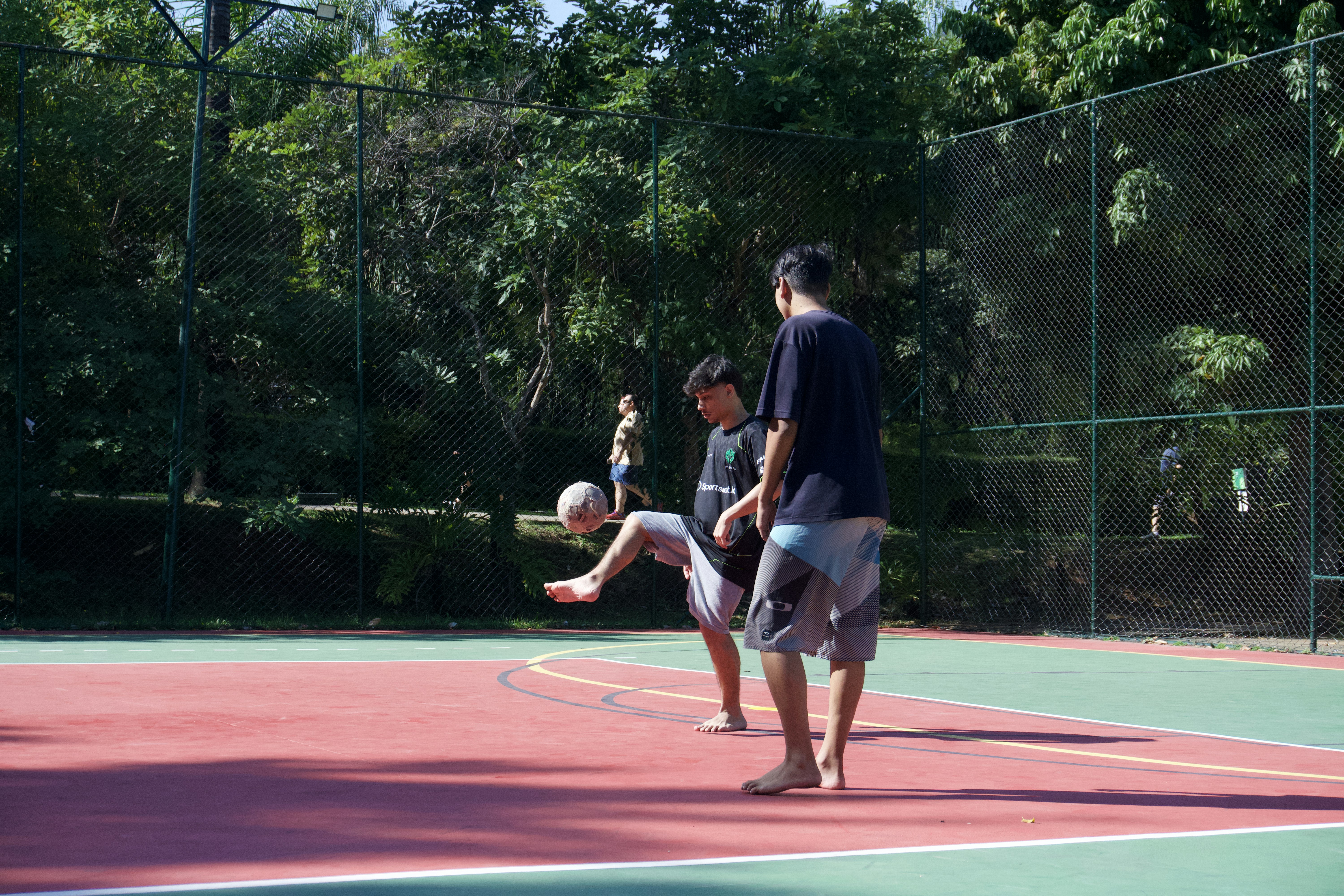 Friends playing soccer