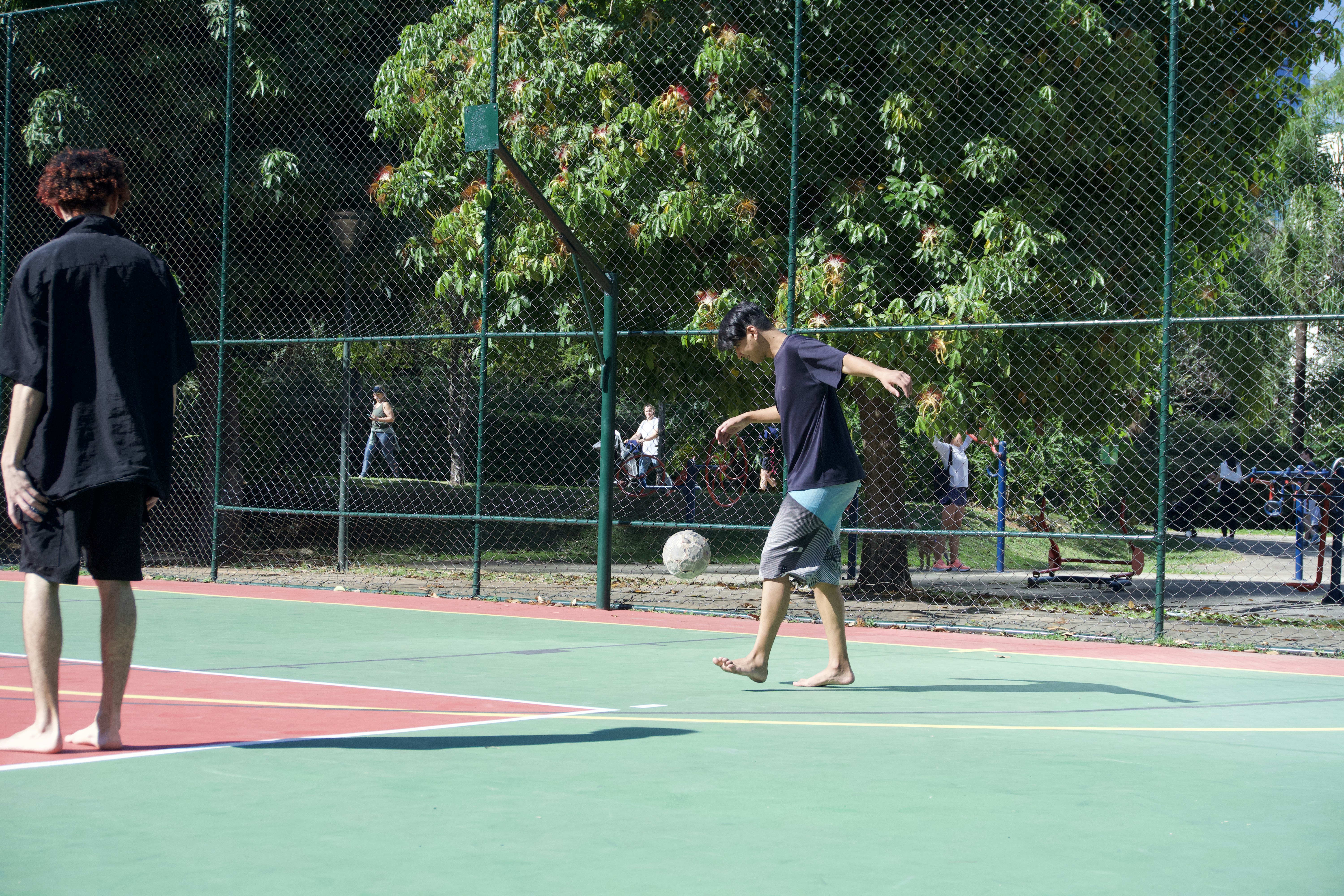Friends playing soccer