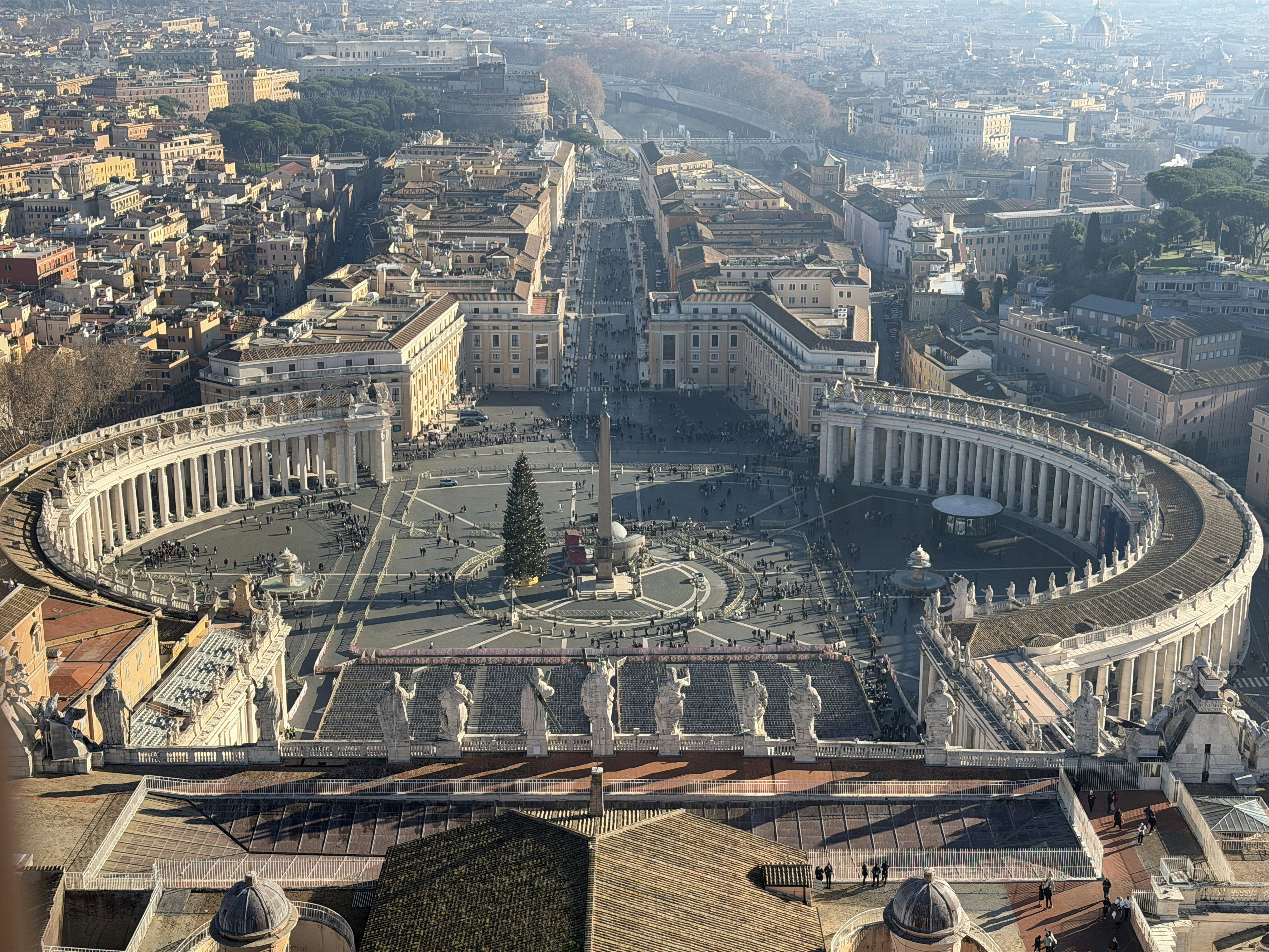 Aerial view of st. peter's square with a christmas tree.