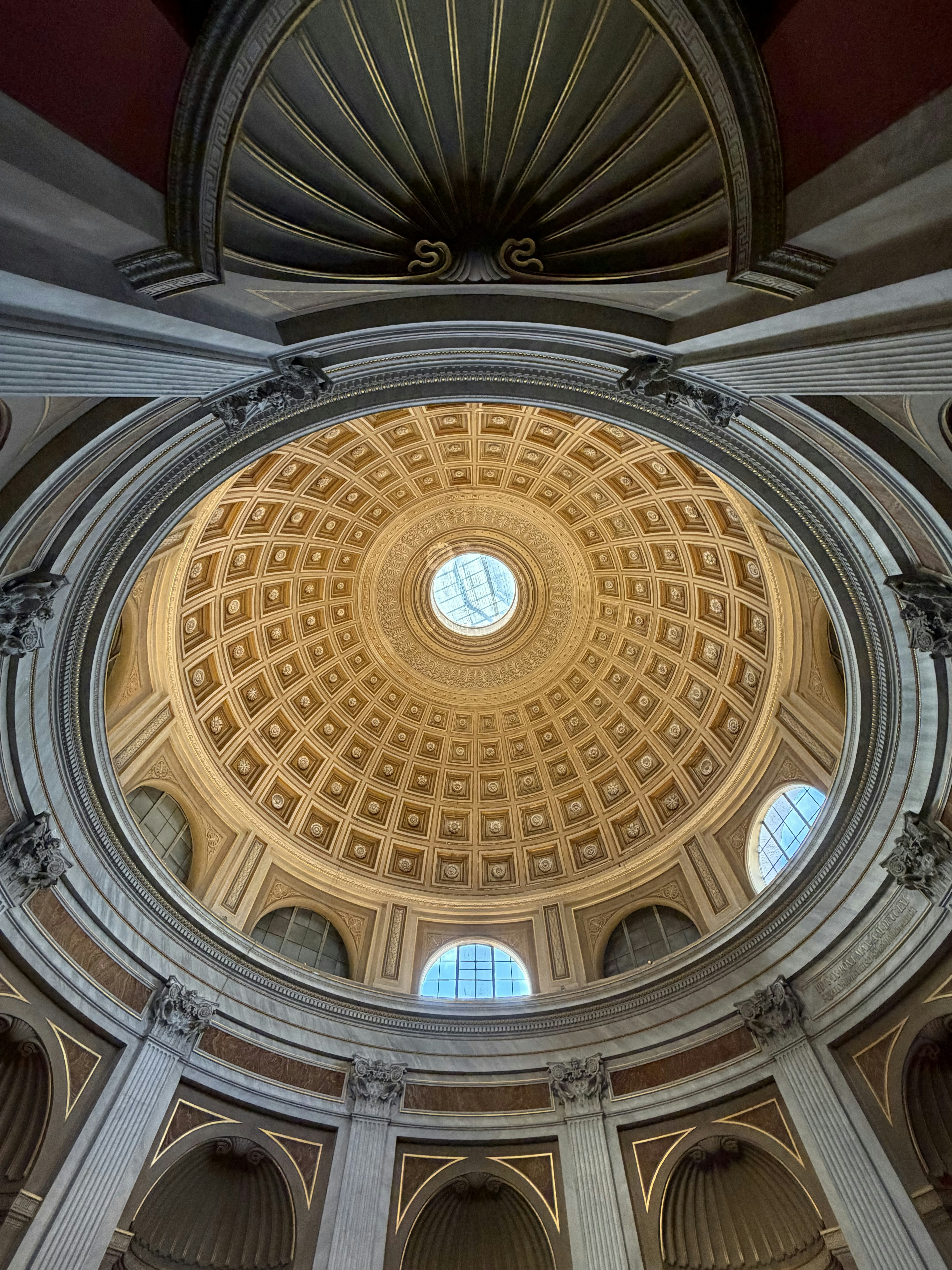 Intricate dome interior with sunlight streaming through