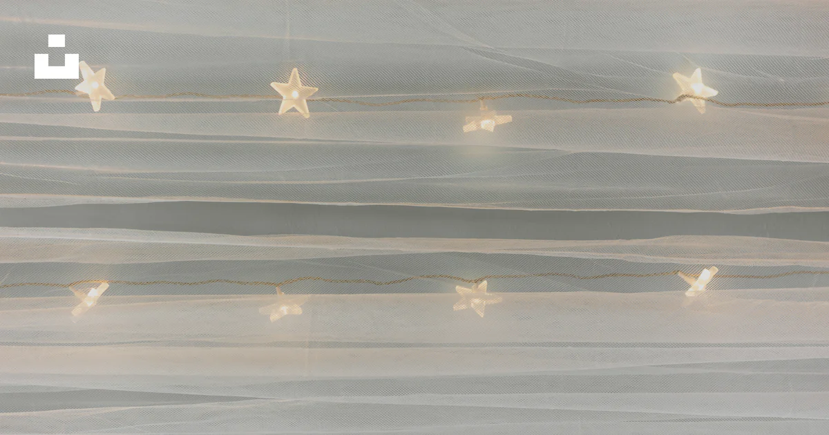 Light Like Fairy lights shaped like stars on a white background. photo – Free ...