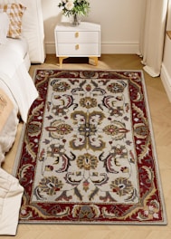 A traditional persian rug with intricate patterns.