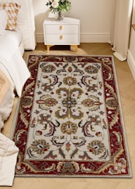 A traditional persian rug with intricate patterns.