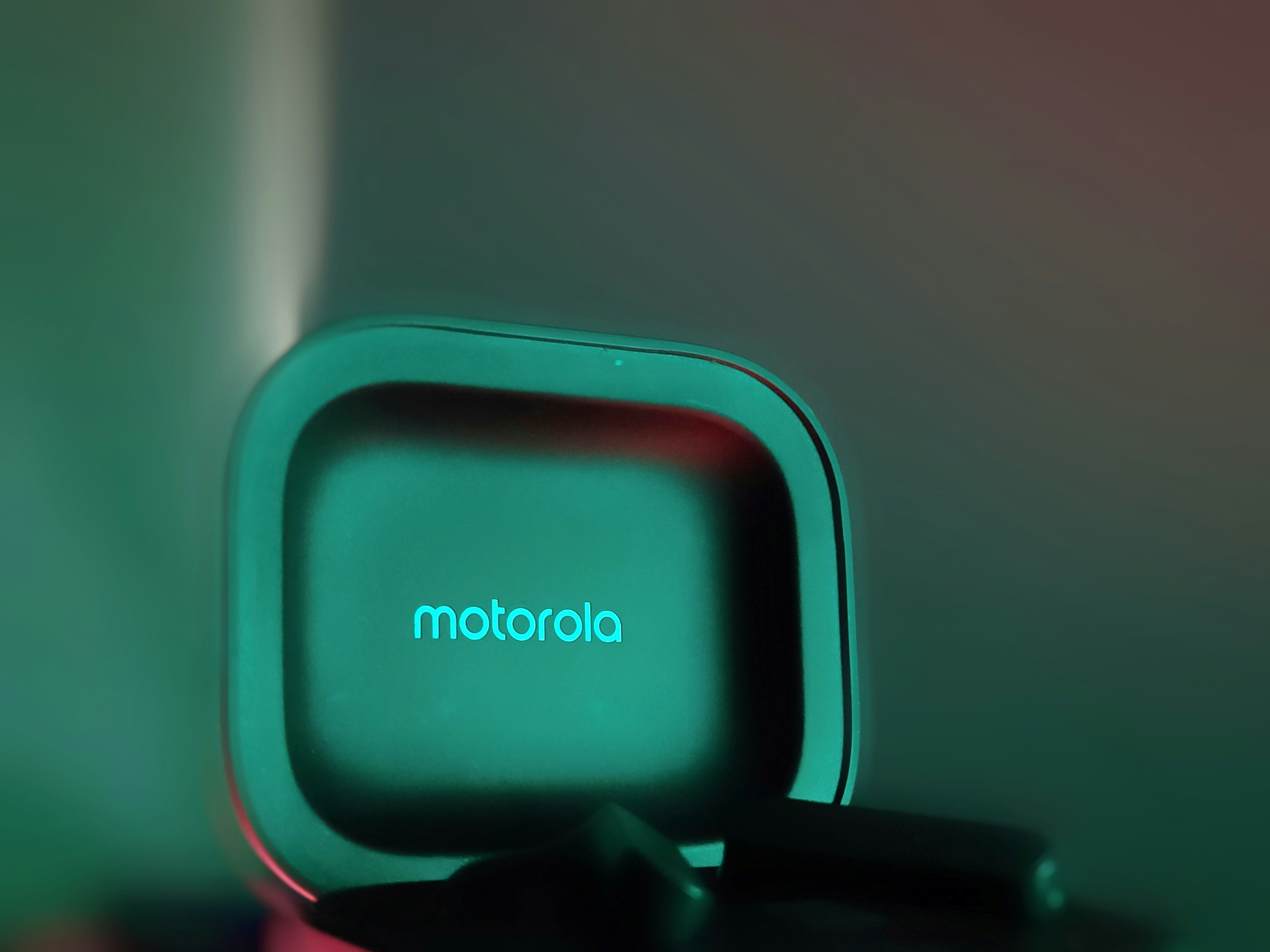 Motorola logo on a teal square device