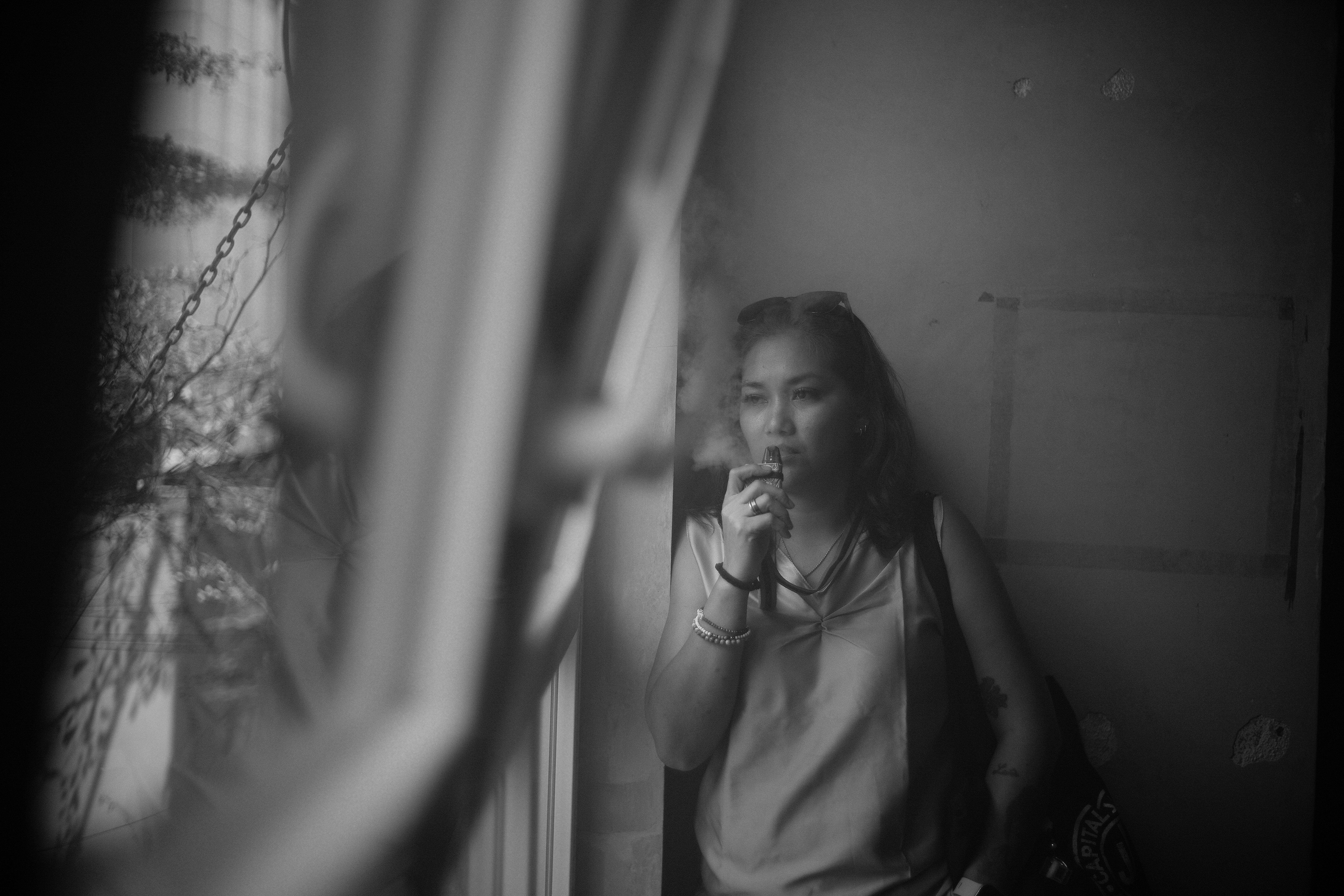 A woman looking out a window