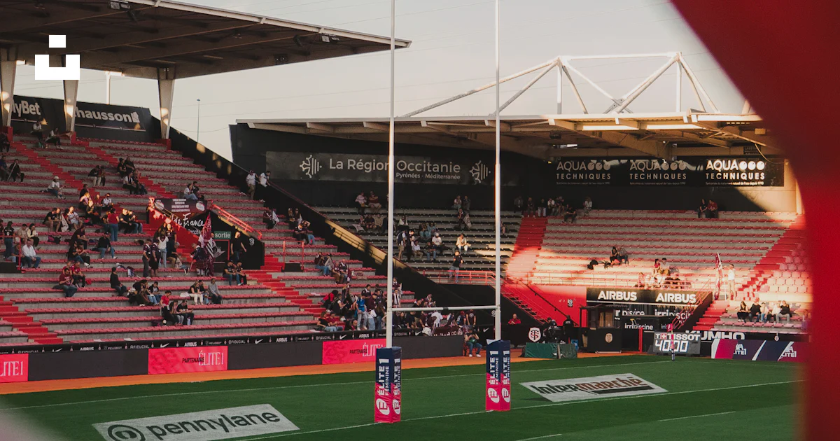 Tbc Rugby Stand Rugby stadium with goalposts and spectators in stands photo – Free ...