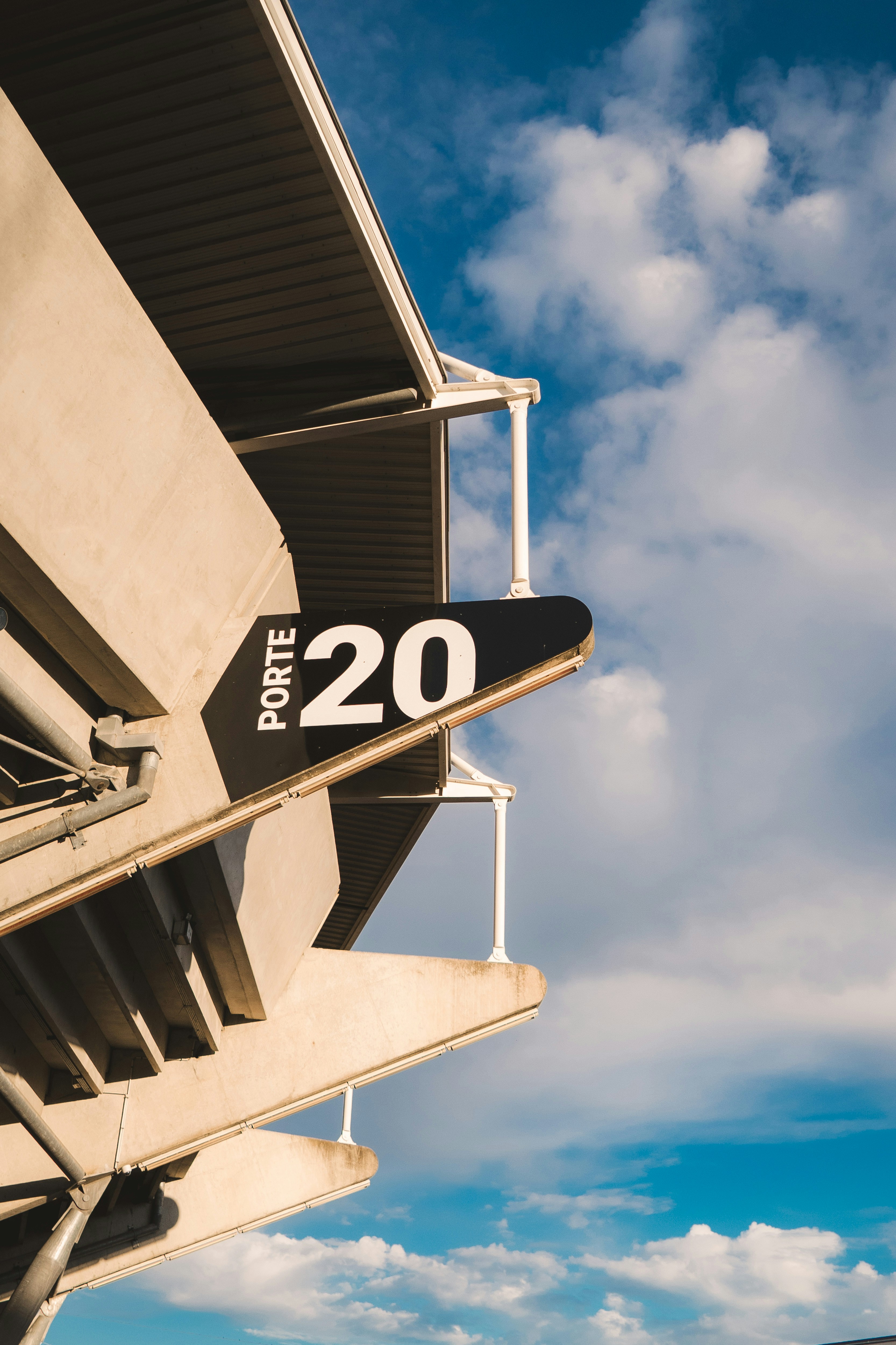 Stadium entrance gate with sign for porte 20